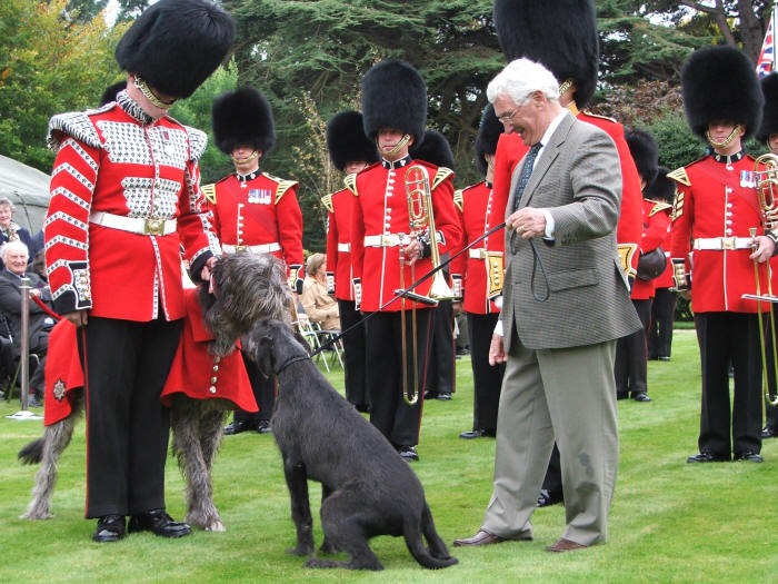 Jim handing over mascot